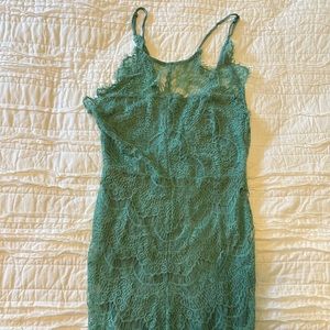 Free people light green dress, size XS. Buttons on the back :)